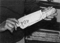 404 Interceptor balsa model plane with wings folded back all the way